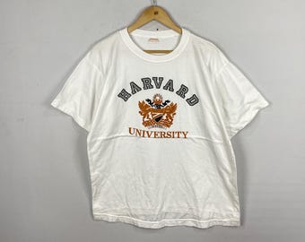ハーバード大学 ホワイトグラフィックTシャツ - Etsy 日本