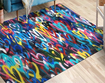 Puede incluir: Una alfombra colorida con un diseño de estilo graffiti que presenta corazones en varios colores, incluidos rojo, azul, amarillo, rosa y blanco.