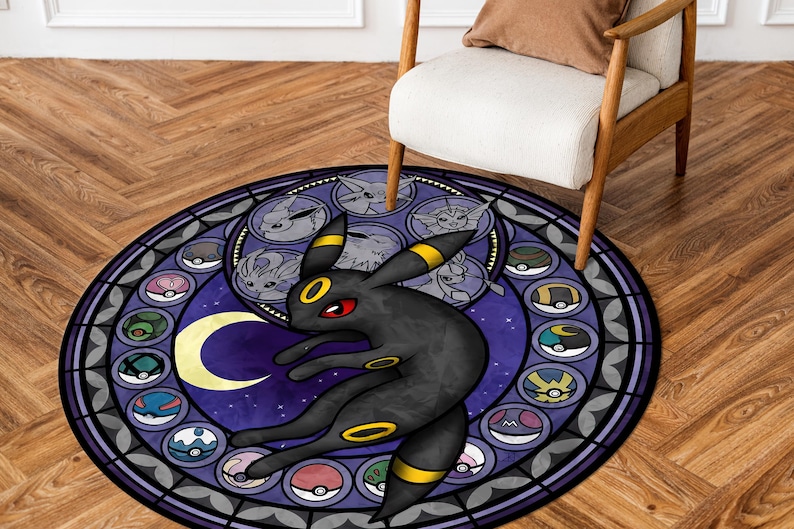 May include: A round, purple and black rug with a stained glass design featuring a black Pokemon character with yellow accents. The character is surrounded by smaller Pokemon characters in a circle.