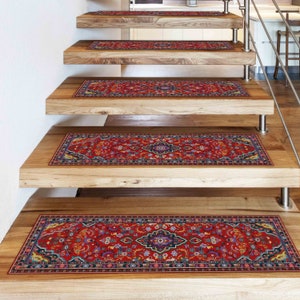May include: Red, blue, and gold patterned stair treads with a traditional Persian rug design. The stair treads are made of wood and are covered with a non-slip surface.