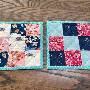 Posavasos acolchados a mano (juego de 2): posavasos con cuadros florales