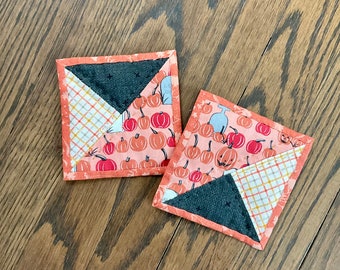 Quilted mug rugs - set of 2 orange and black Halloween pumpkins coasters reversible
