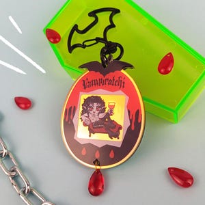 Tamagotchi-inspired vampire keychain | Vampirotchi | blood | bat