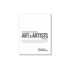 May include: Book cover with the title "Alternative Photography Art & Artists Edition 2". The cover is white with black text and a small red square with the words "alternative photography" in white text.