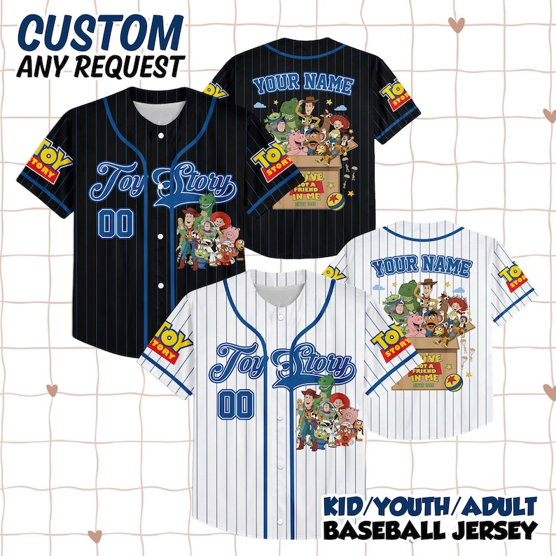 May include: Two baseball jerseys, one black and one white, both featuring blue pinstripes, a Toy Story logo, the number 00, and a graphic of Toy Story characters. The back of each jersey displays the text Your Name and a box of characters.
