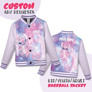 May include: A baseball jacket with a galaxy-themed design in shades of purple, pink, and blue. The jacket features a cartoon character on the front and back, with the name "Angel" on the front and "Your Name" on the back. The sleeves are white.