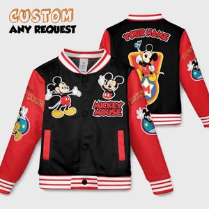 May include: Black and red Mickey Mouse varsity jacket with white trim. The jacket features Mickey Mouse graphics and the text "Mickey Mouse" on the front. The back of the jacket has the text "Your Name" and a Mickey Mouse graphic.