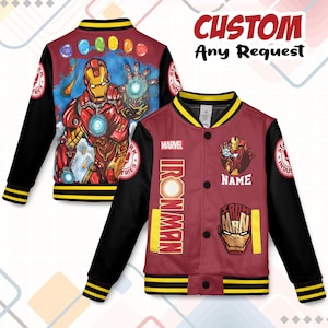 May include: A maroon and black Iron Man bomber jacket with a yellow collar and cuffs. The back features a colorful Iron Man graphic and the text "CUSTOM Any Request". The front displays the Marvel logo and "IRON MAN" text.