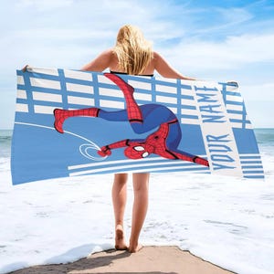 May include: A set of three ceramic mugs with a speckled, cream-colored glaze. Each mug features a different hand-painted floral design in shades of blue, green, and yellow. The mugs have a simple, rounded shape and a comfortable handle.