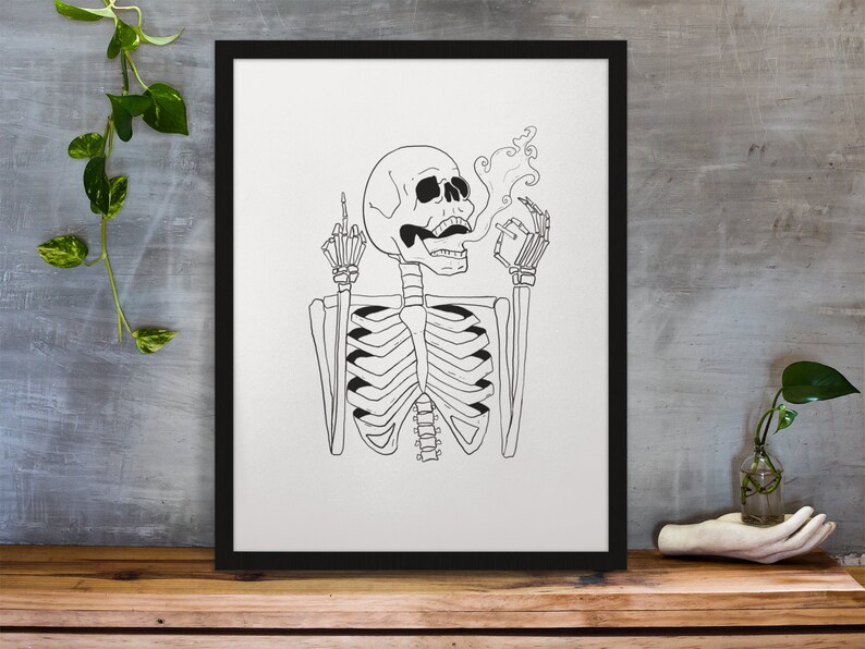 May include: Black and white line art print of a skeleton giving the middle finger and smoking a cigarette. The skeleton is wearing a skull and has a rib cage.
