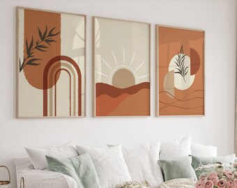 May include: Three framed abstract art prints with a neutral color palette of beige, rust, and brown. The prints feature geometric shapes, sun, and plant designs. The words "DIGITAL DOWNLOAD HIGH QUALITY PRINT" are on a brown sticker.