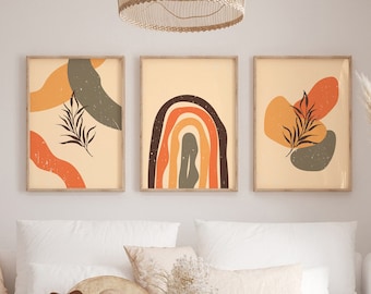 May include: Three framed abstract art prints with a beige background. Each print features organic shapes in orange, brown, and green, with a textured appearance. One print has a rainbow design. The prints are labeled "DIGITAL DOWNLOAD" and "HIGH QUALITY PRINT".