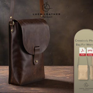 Puede incluir: Bolso bandolera de cuero marrón para teléfono con cierre de solapa y correa ajustable. El bolso tiene forma rectangular con bordes redondeados y herrajes dorados. El texto "LUCE LEATHER" es visible.