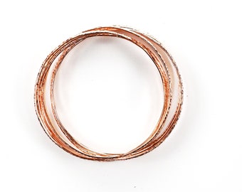 7 Piece Interlocked Bangle Bracelet 70mm with Embossing Detail