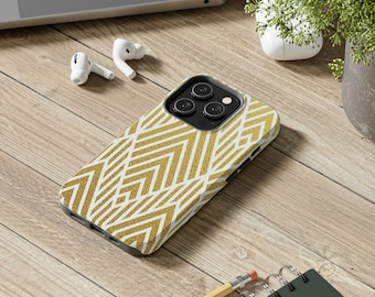 Puede incluir: Una funda para teléfono blanca y dorada con un patrón geométrico. La funda está diseñada para un iPhone con una protuberancia de cámara.