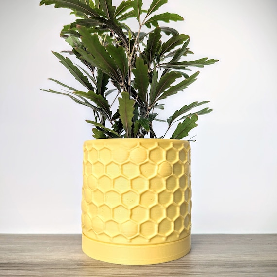 Light Pastel Yellow Pot Honeycomb Planter with Drainage Tray Made from an Eco Friendly Plant Based Plastic