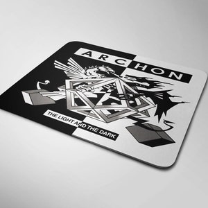 May include: Black and white mousepad with a geometric design and the text "ARCHON THE LIGHT AND THE DARK".