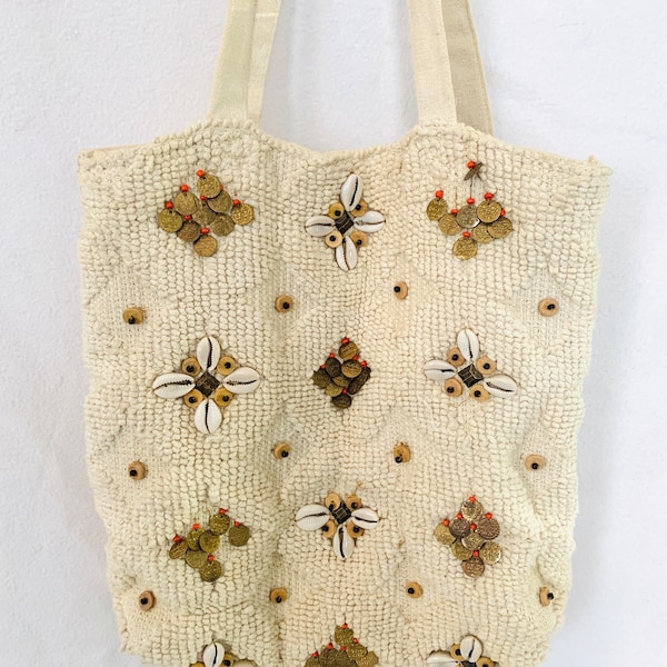Boho cloth & canvas purse/ over the shoulder bag. Decorated with shells, beads, coins. Zip pocket interior, snap closure.