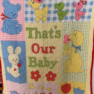 That’s our baby blanket. Red, blue, yellow, vintage baby blanket. Adorable animals and gingham, baby shower gift. Lightweight, cotton.