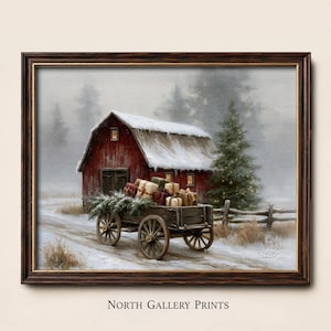 Puede incluir: Una impresión artística enmarcada que representa una escena invernal nevada con un granero rojo, un carro de madera lleno de cajas de regalo envueltas y ramas de pino, y un árbol de Navidad decorado, con el texto North Gallery Prints abajo.