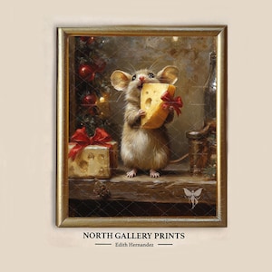 May include: A framed print featuring a brown mouse holding a large wedge of yellow cheese with a red bow. Beside the mouse is a gift box wrapped with a red ribbon and a decorated Christmas tree. The text NORTH GALLERY PRINTS Edith Hernandez appears below.