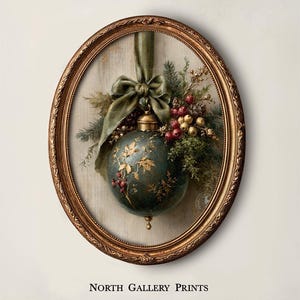 May include: An oval-framed print titled North Gallery Prints featuring a dark teal Christmas ornament with gold leaf botanical details, suspended by a sage green ribbon, accented with pine branches, red berries, and pinecones.