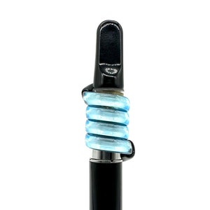 May include: A black vape pen with a blue silicone mouthpiece. The mouthpiece is made of multiple rings that are stacked on top of each other.