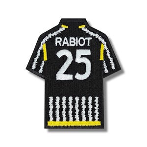 May include: Black and white football jersey patch with yellow accents. The jersey has the name "RABIOT" and the number "25" on the back.