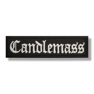 Peut inclure: Écusson rectangulaire noir avec le mot "Candlemass" brodé en lettres gothiques blanches. Le patch a une surface texturée et une bordure blanche.