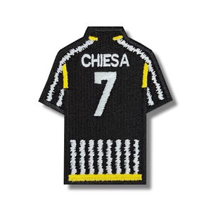 May include: Black and white striped football shirt patch with the name "CHIESA" and the number "7" in white.