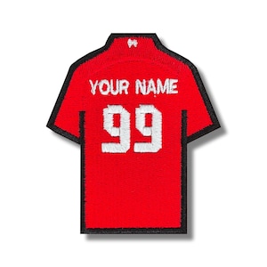 May include: Red and black embroidered iron-on patch shaped like a jersey with the text "YOUR NAME" and the number "99" in white.