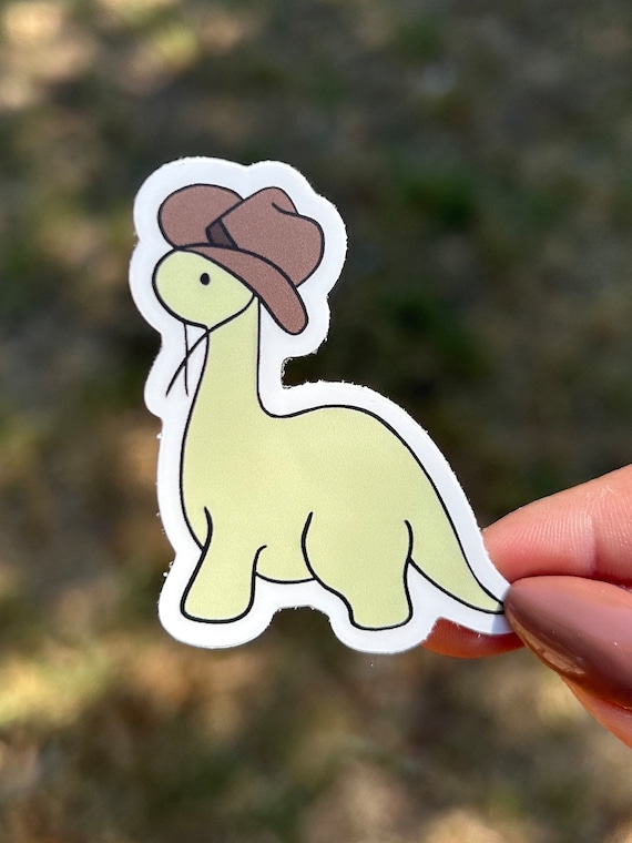 dinosaur wearing a cowboy hat sticker, cowboy sticker, dinosaur sticker, cute sticker, funny sticker, adorable, kawaii sticker, waterproof