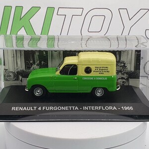 May include: A green and white 1966 Renault 4 van model in a display case. The van has the words "Valle Fiori" and "Consegne a Domicilio" on the side.