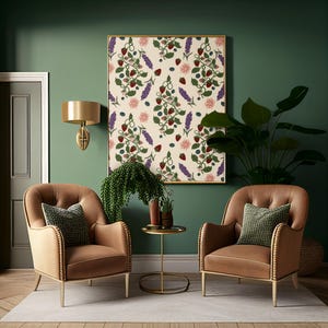 May include: A living room scene with two brown armchairs, each with a green pillow. A framed artwork with a botanical pattern of berries and flowers hangs above. A small gold side table and a wall-mounted gold lamp complete the decor.