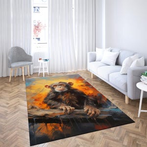 May include: A colourful rug featuring a painting of a chimpanzee sitting on a branch. The chimpanzee is looking directly at the viewer. The rug has a yellow, orange, and brown background.