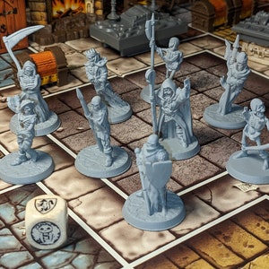 May include: A set of nine gray plastic miniature figures of skeletons and undead creatures, including a reaper, a skeleton archer, and a skeleton warrior. The figures are arranged on a game board with a gray and white dice in the foreground.