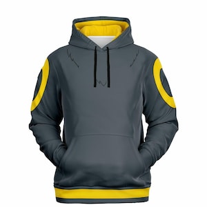 May include: A gray hoodie with yellow accents. The hoodie has a yellow band around the hood, the sleeves, and the bottom. The hoodie has a black drawstring and a kangaroo pocket.