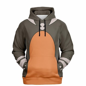 May include: A gray hoodie with an orange front panel and a white and black design. The hoodie has a kangaroo pocket and a hood. The design resembles a cartoon character.
