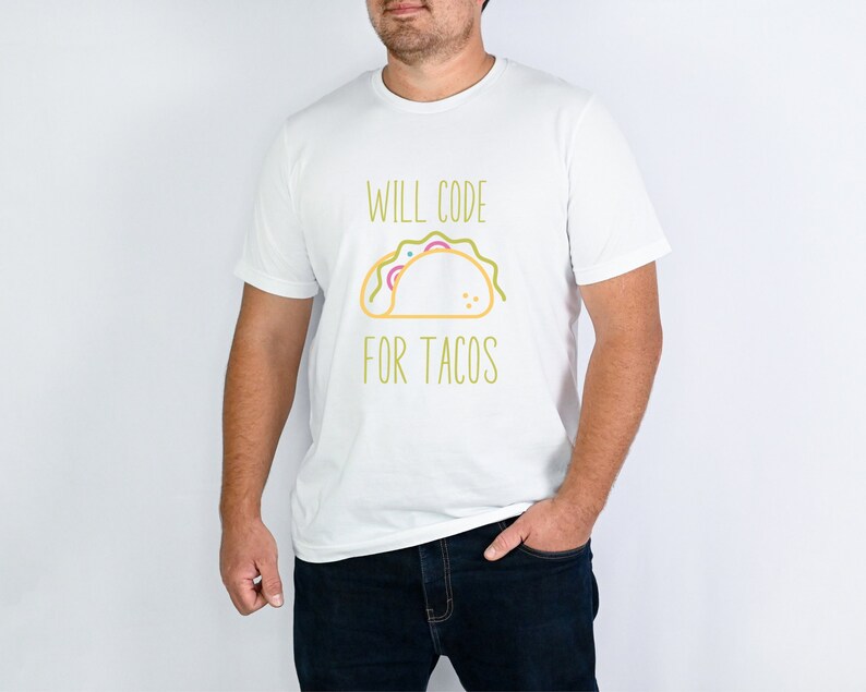 May include: White t-shirt with the text "Will Code For Tacos" and a cartoon taco graphic.