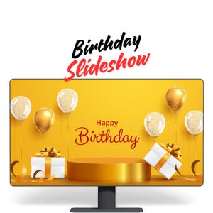 May include: A computer monitor displaying a birthday slideshow with a yellow background, gold balloons, and the text "Happy Birthday".