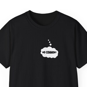 May include: Black t-shirt with a white thought bubble graphic that says "NO COMMENT".