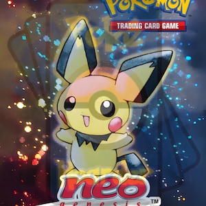May include: A yellow Pokemon card with a Pikachu illustration. The card has a blue background with a sparkly effect. The text "Pokemon Trading Card Game" and "Neo Genesis" are visible on the card.