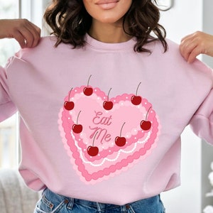 Cherry Heart Cake Sweatshirt, Cute Cottagecore Crewneck, Trendy TikTok Pink and Pearls Frosted Cake, &quot;Eat Me&quot; Soft Long Sleeve Graphic Top