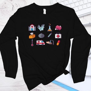 Resta comodo ed elegante con questa camicia da infermiera: perfetta per professionisti medici, scuola per infermieri, scuola di medicina, camicia sanitaria