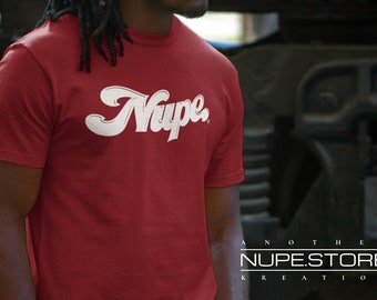 May include: Red t-shirt with a white "Nupe" logo in a retro font. The logo is stylized with a wave-like design. The text "ANOTHER NUPE.STORE KREATION" is visible at the bottom of the image.
