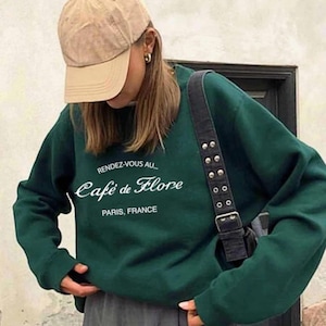 Sweater Cafe de Flore Paris Coffee Shop Trui Cafe de Flore | Vintage jaren 90 preppy Parijse Ami Paris Cafe-sweater met ronde hals en ronde hals