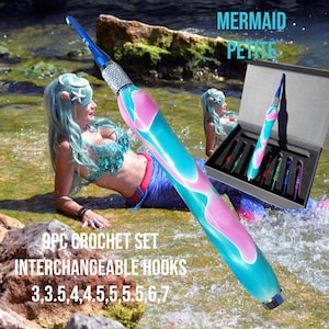 May include: A Mermaid Petite 9pc crochet set with interchangeable hooks. The crochet hook handle is a swirl of blue and pink. The set includes hook sizes 3, 3.5, 4, 4.5, 5, 5.5, 5, 6, and 7.