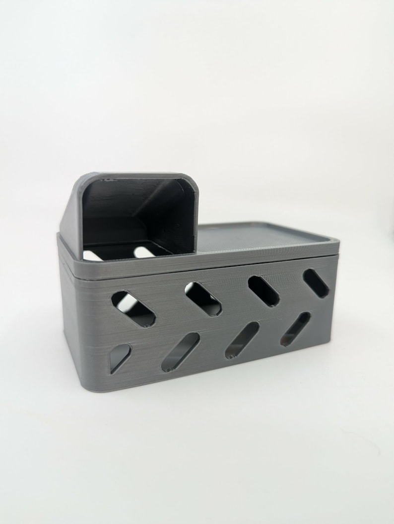 May include: A white ceramic mug with a black handle and the text "But First, Coffee" in a black, bold font. The mug is sitting on a wooden surface. The mug is 4 inches tall.