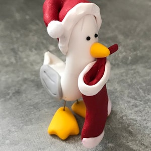 10 diversi modelli di statuette di gabbiani natalizi