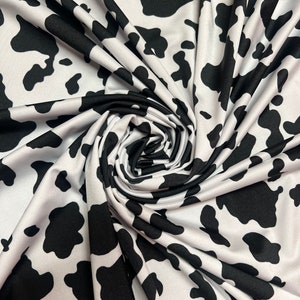 New cow pattern design print on the best quality of nylon spandex 4-stretch 58/60”sold by the YD.Ships worldwide from Los Angeles CA.